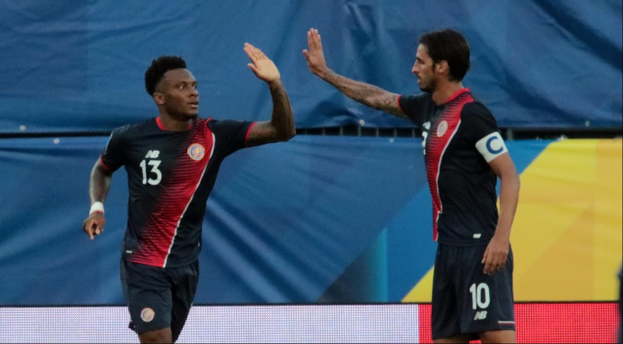 Jul 14, 2017; Frisco, TX, USA; [Costa Rica midfielder Rodney Wallace (13) celbrats with teammate Costa Rica midfielder Bryan Ruiz (10) after scoring a goal in the second half against French Guiana at Toyota Stadium. Mandatory Credit: Sean Pokorny-USA TODAY Sports