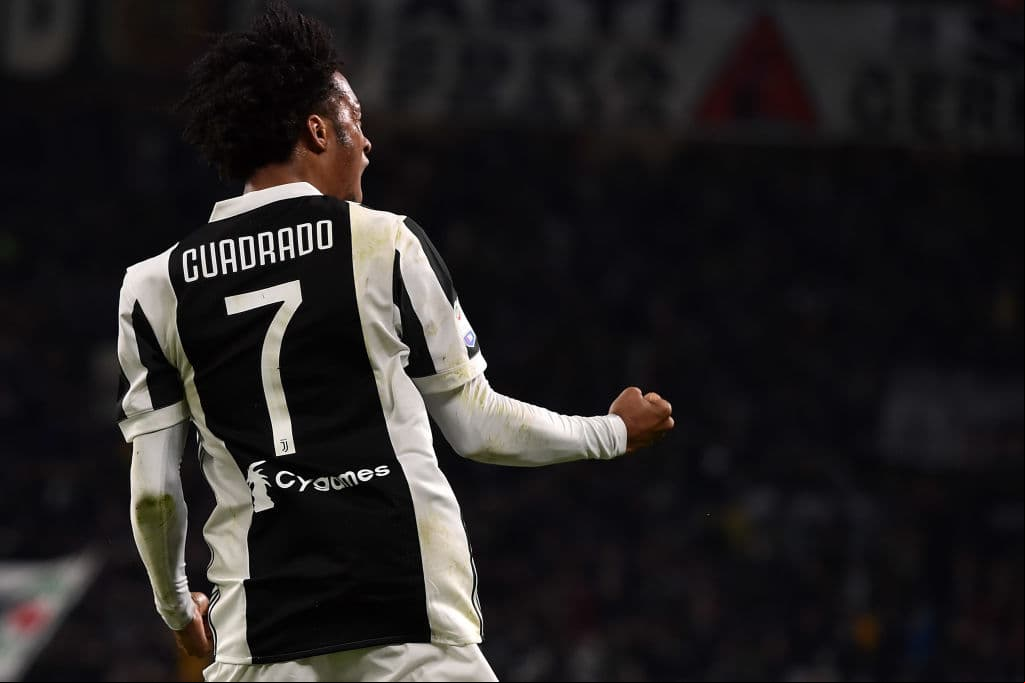 TURIN, ITALY - MARCH 31: Juan Cuadrado of Juventus celebrates after scoring his team's third goal during the serie A match between Juventus and AC Milan at Allianz Stadium on March 31, 2018 in Turin, Italy. (Photo by Tullio M. Puglia/Getty Images )