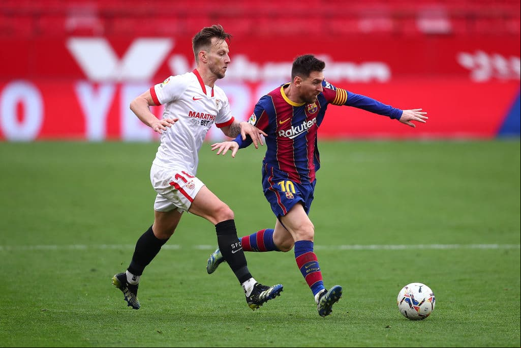 Iván Rakitic y Lionel Messi.