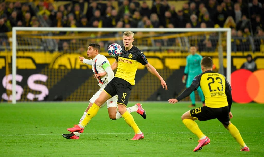 Dortmund's Norwegian forward Erling Braut Haaland (C) vies for the ball with Paris Saint-Germain's Brazilian defender Thiago Silva (L) during the UEFA Champions League Last 16, first-leg football match BVB Borussia Dortmund v Paris Saint-Germain (PSG) in Dortmund, western , on February 18, 2020. (Photo by Ina Fassbender / AFP) (Photo by INA FASSBENDER/AFP via Getty Images)