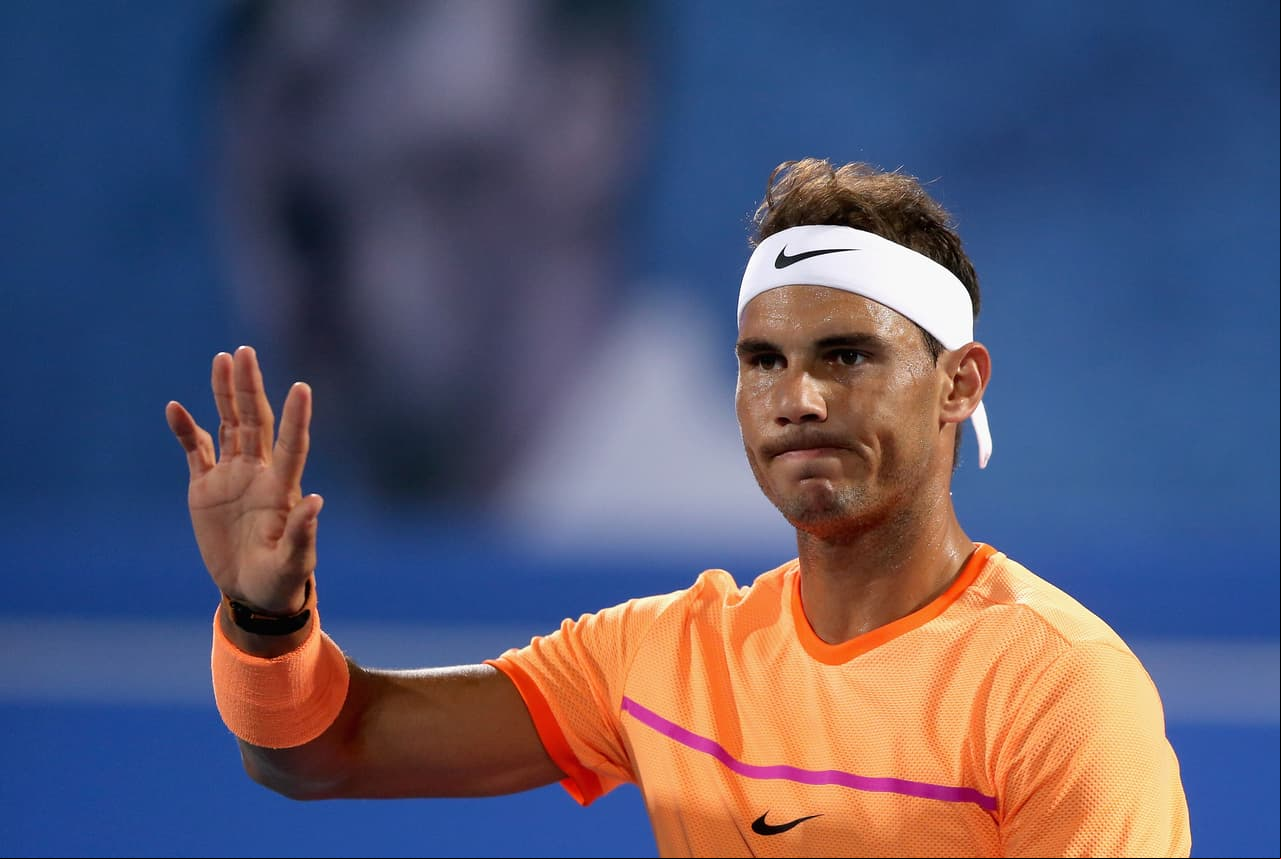 ABU DHABI, UNITED ARAB EMIRATES - DECEMBER 29: Rafael Nadal of Spain reacts during day one of the Mubadala World Tennis Championship at Zayed Sport City on December 29, 2016 in Abu Dhabi, United Arab Emirates. (Photo by Francois Nel/Getty Images)