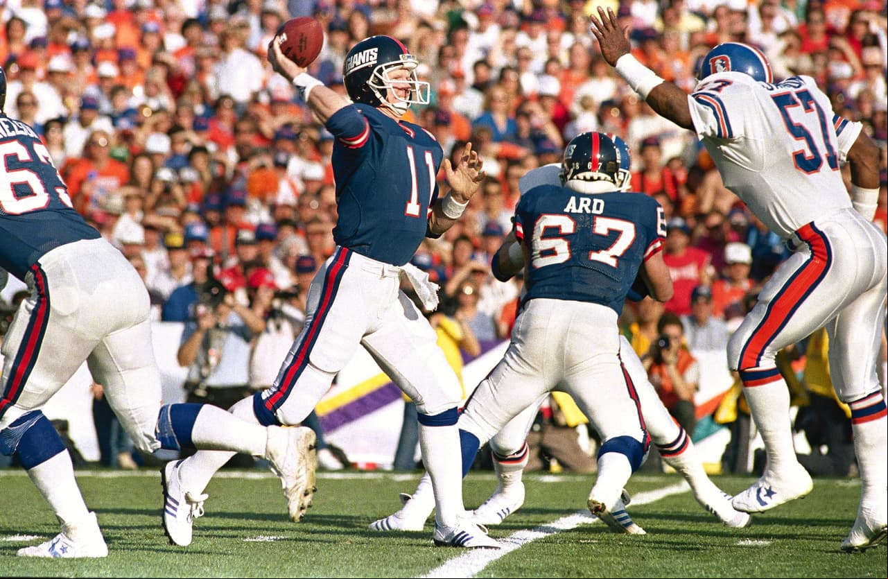 Super Bowl XXI (Denver Broncos 20-39 New York Giants) | Se disputó en el Rose Bowl en Pasadena. MVP: Phil Simms (QB NY Giants). Costo del comercial de 30 segundos: 600 mil dólares por la CBS.