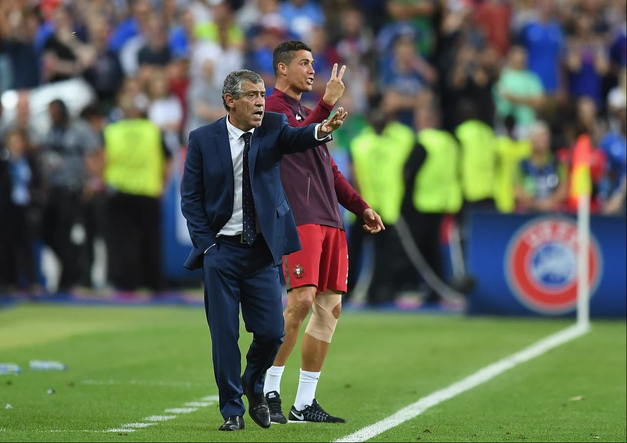 PARIS,  - JULY 10: Cristiano Ronaldo and manager Fernando Santos gestures on the touchline during the UEFA EURO 2016 Final match between Portugal and  at Stade de  on July 10, 2016 in Paris, . (Photo by Laurence Griffiths/Getty Images)