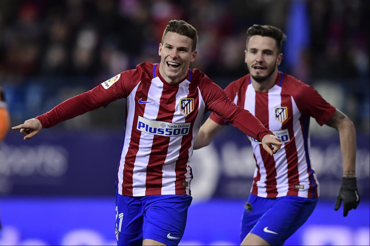 Atletico Madrid's French forward Kevin Gameiro (L) and Atletico Madrid's midfielder Saul Niguez celebrate after scoring during the Spanish Copa del Rey (King's Cup) quarter final first leg football match Club Atletico de Madrid vs SD Eibar at the Vicente Calderon stadium in Madrid on January 19, 2017. / AFP / JAVIER SORIANO (Photo credit should read JAVIER SORIANO/AFP/Getty Images)
